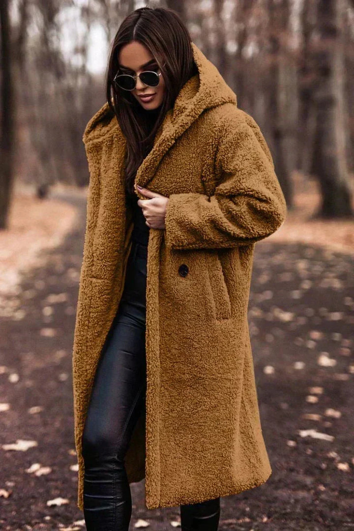 Long coat with elegant faux fur warmth and Timeless style