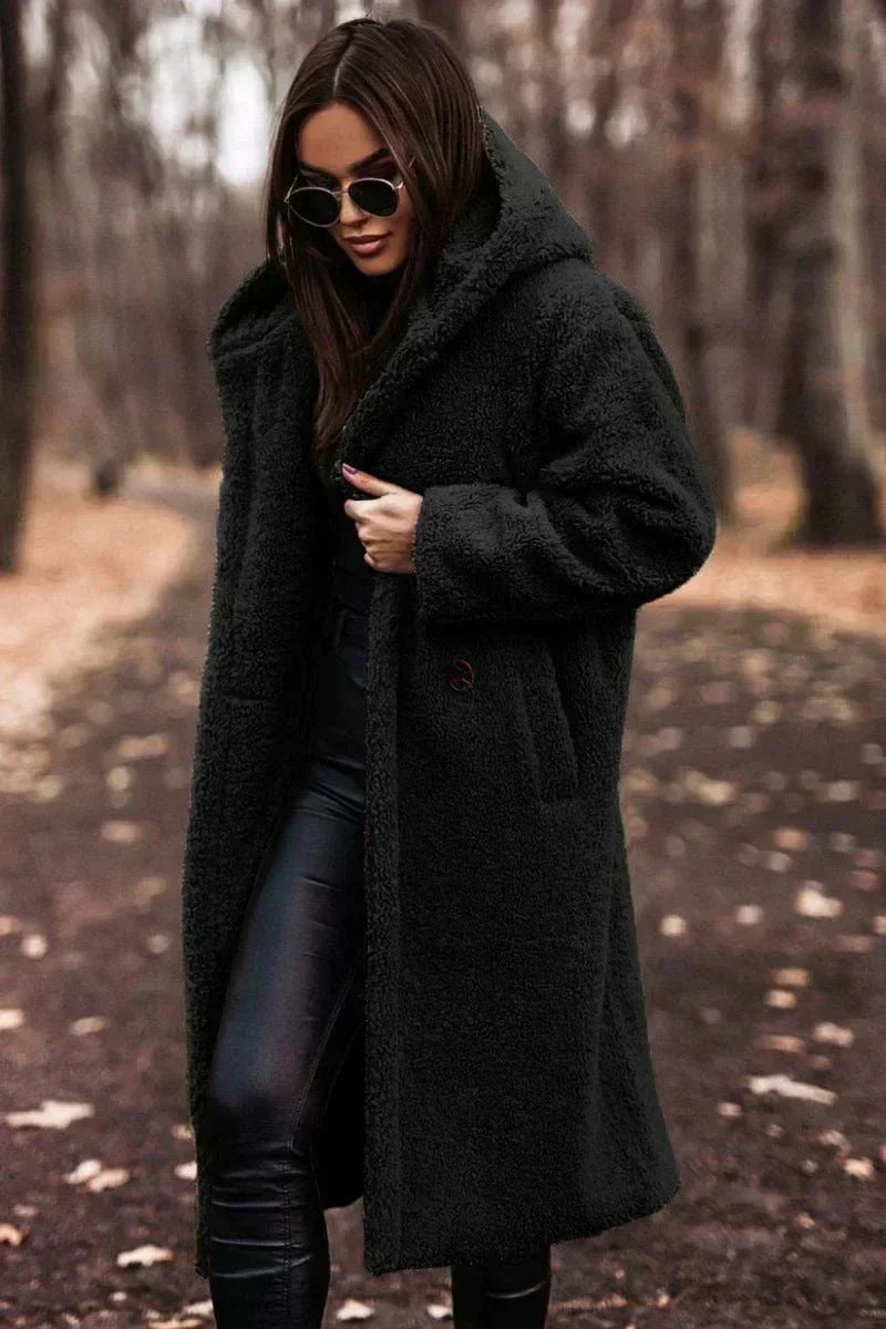 Long coat with elegant faux fur warmth and Timeless style